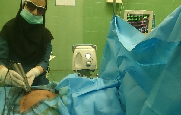 Laser radiation to surgical site